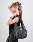Soft-Structured Biker Shoulder Bag with Curved Panels