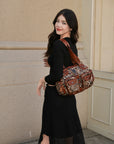 Biker-Style Multi-Pocket Shoulder Bag with Animal-Print Panels