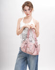 Curved-Panel Studded Buckle Shoulder Tote Bag
